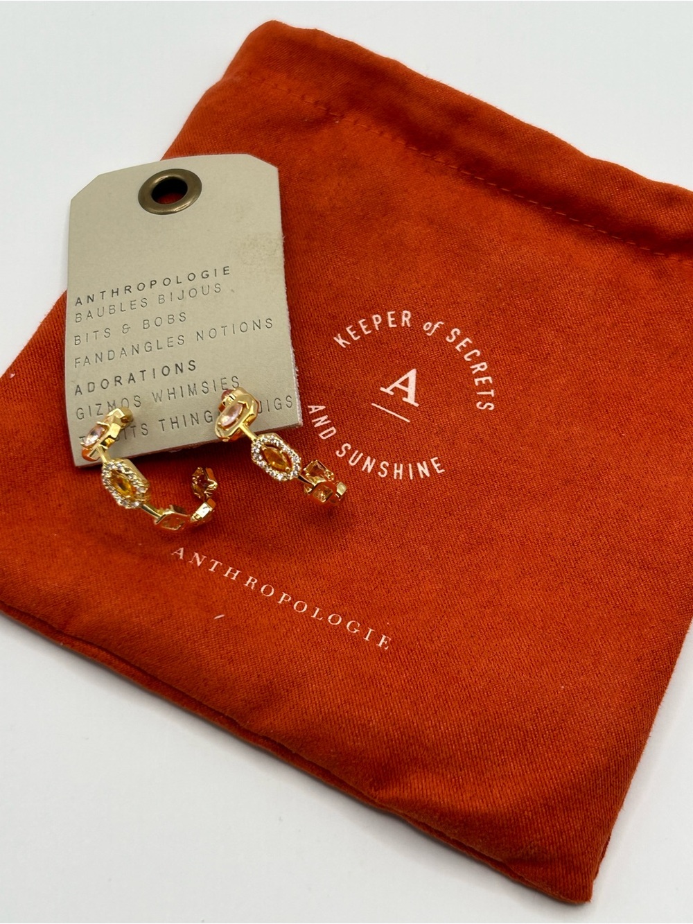Anthropologie Gold Crystal Link Hoop Earrings with Orange Pouch